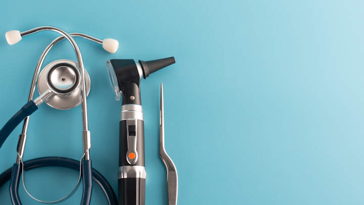 An otoscope and other tools an audiologist might use.