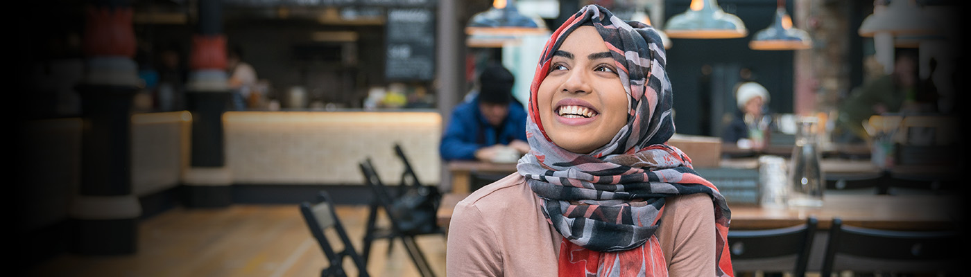 Tasnim, an undergraduate student, eating at a restaurant in Manchester.